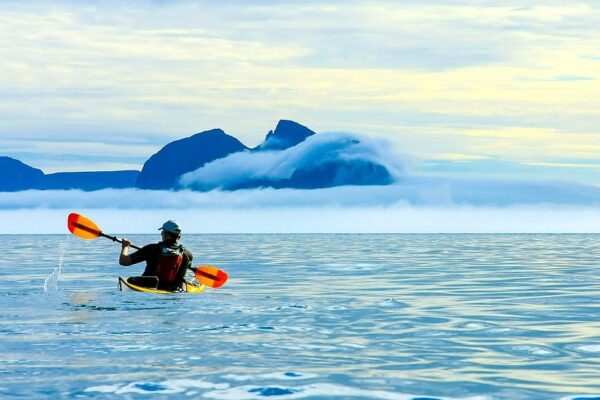 men-kayak-open-sea-summer